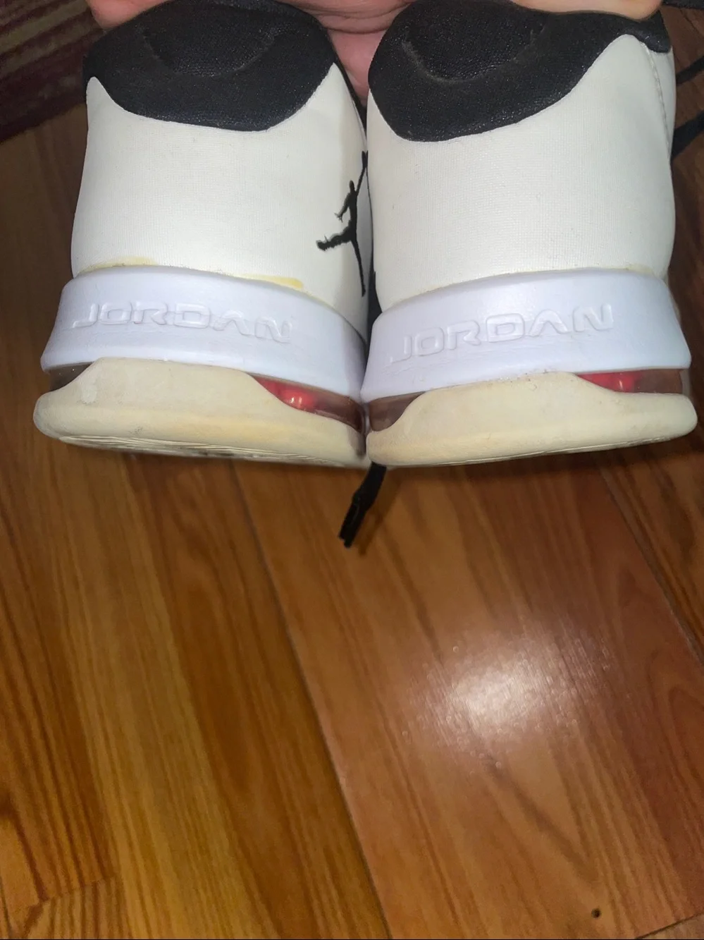 Jordan Men’s White Basketball Sneakers with Black Trim and Red Air Detail